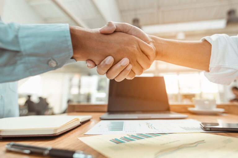 business men shaking hands